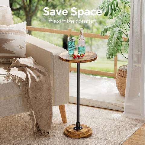 Simple Trending round drink table in a living room setup beside the sofa.