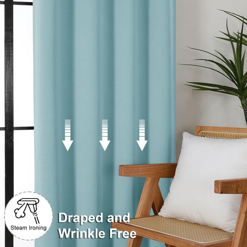 63-inch length fits standard windows with generous coverage and a calm aqua tone.