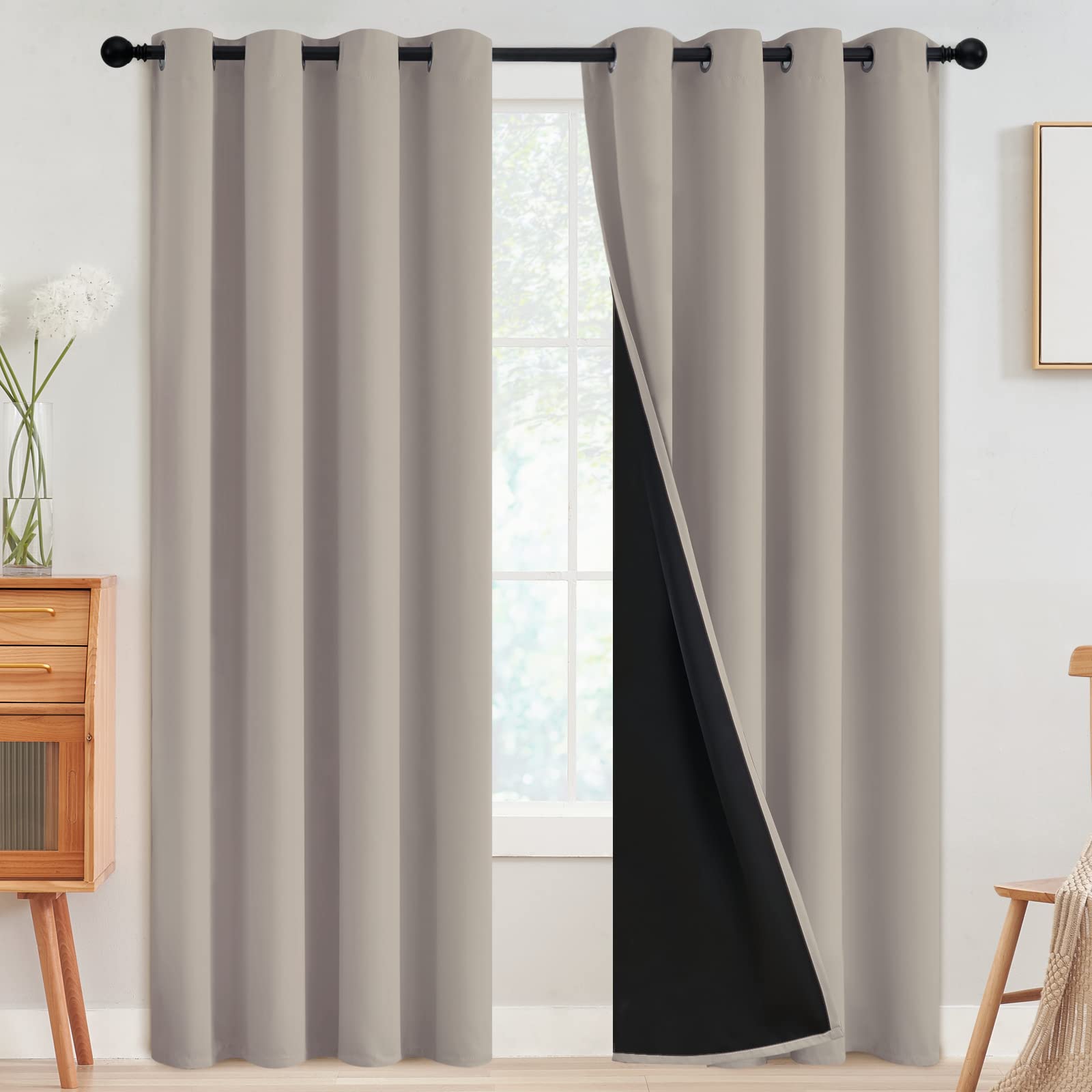 SimpleHome 52x84 blackout curtain pair with 8 silvery grommets for easy sliding.