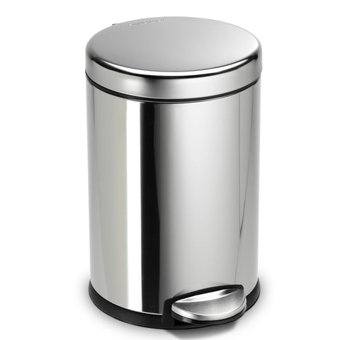 simplehuman 4.5l round bathroom trash can with pedal close for silent operation.