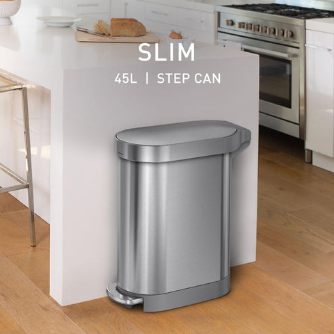 simplehuman 45L slim trash can between cabinets demonstrates kitchen efficiency.