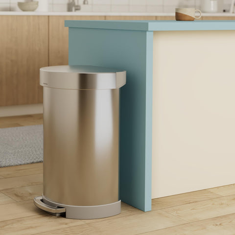 simplehuman 60L semi-round trash can pedal close-up demonstrates durable steel mechanism.