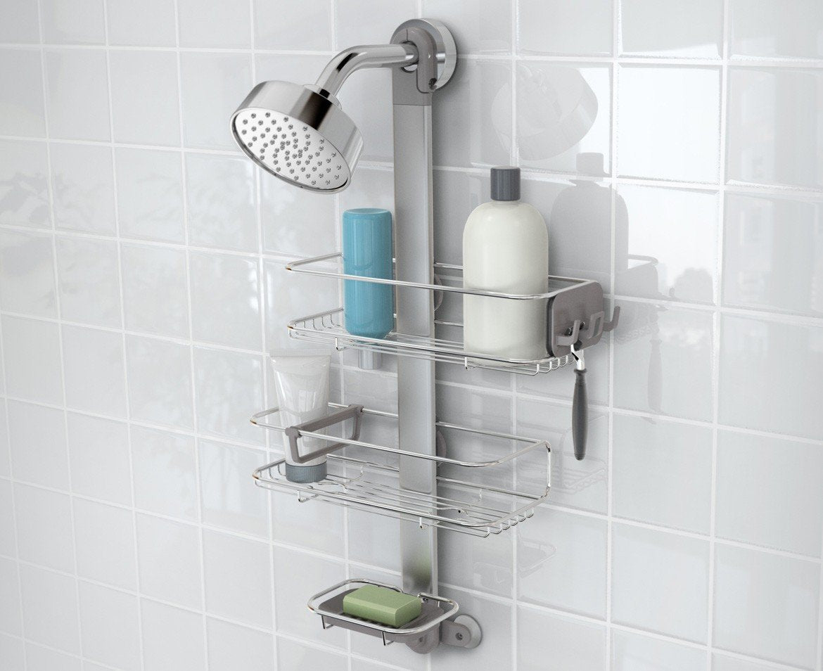simplehuman adjustable shower caddy quick-adjust dial in use