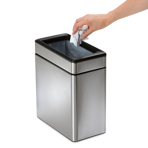 Simplehuman compact trash bin in brushed stainless supports a neat setup.
