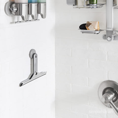 simplehuman fold-away squeegee weighted handle provides stable, smooth glides.