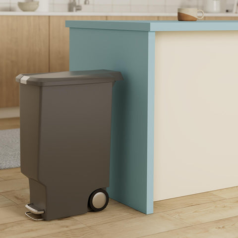 Simplehuman pedal-lid with silent close demonstrates quiet operation during disposal