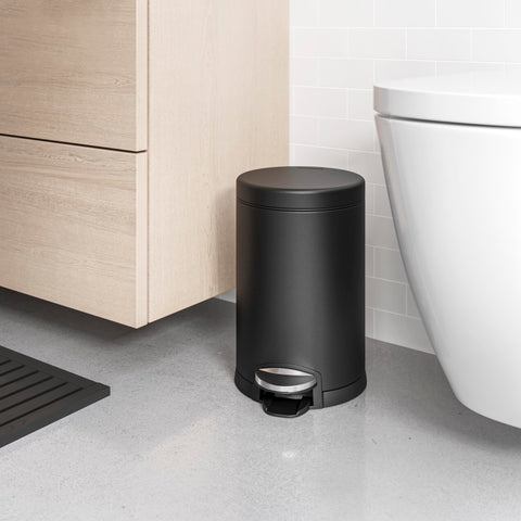 simplehuman round trash can with steel pedal for durable, quiet operation