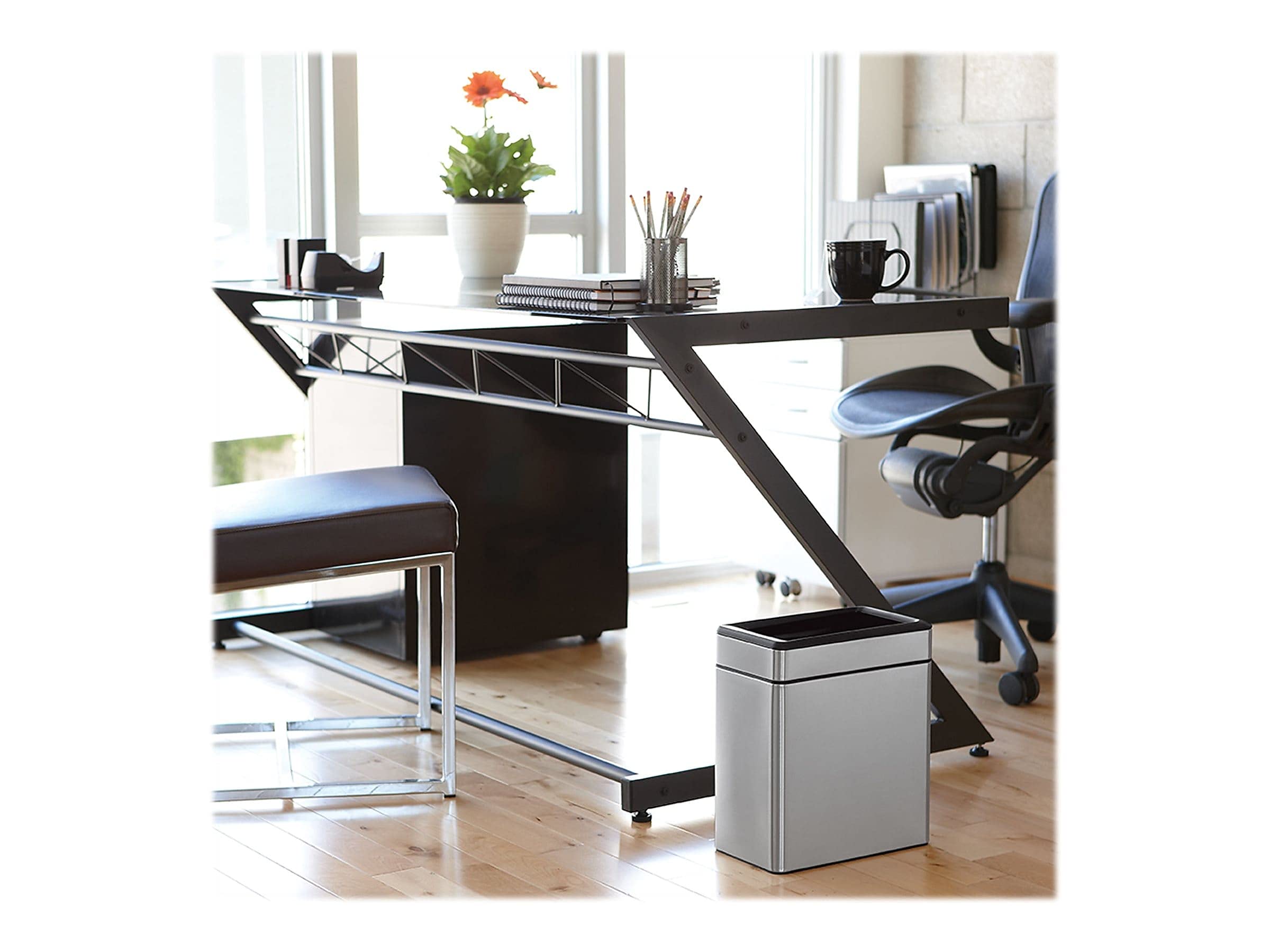 Simplehuman slim trash can fits under desks and in bathrooms for tidy disposal.