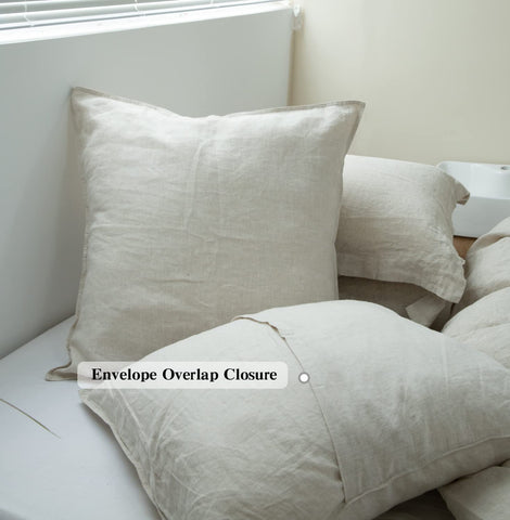 Bedroom scene featuring Simple&Opulence linen pillow covers for a calm, natural look.