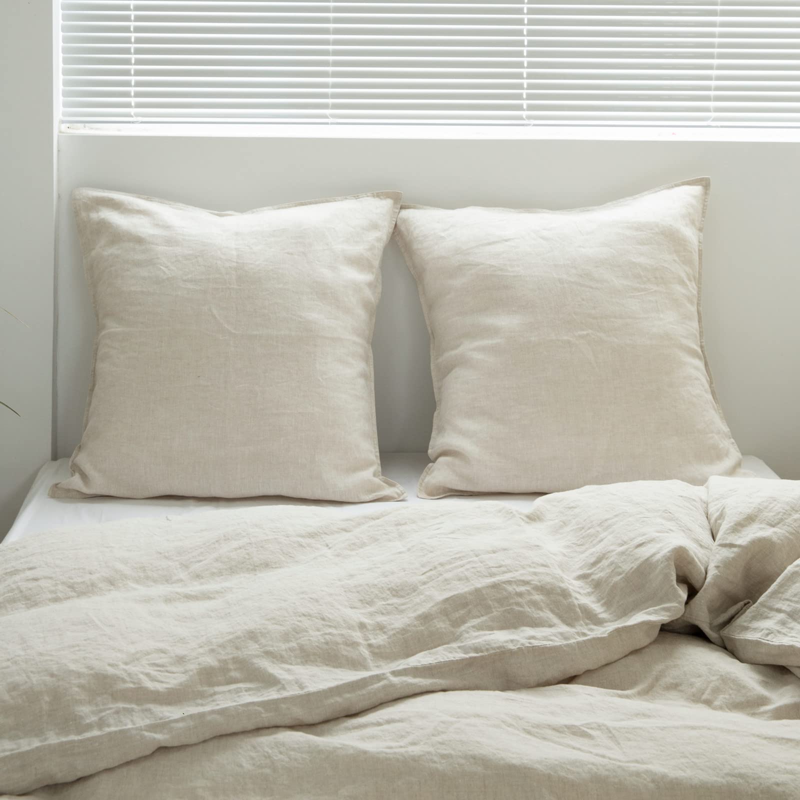 Care instructions label for Simple&Opulence linen euro shams, easy washing guidance.