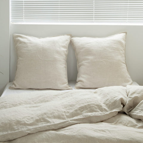 Care instructions label for Simple&Opulence linen euro shams, easy washing guidance.