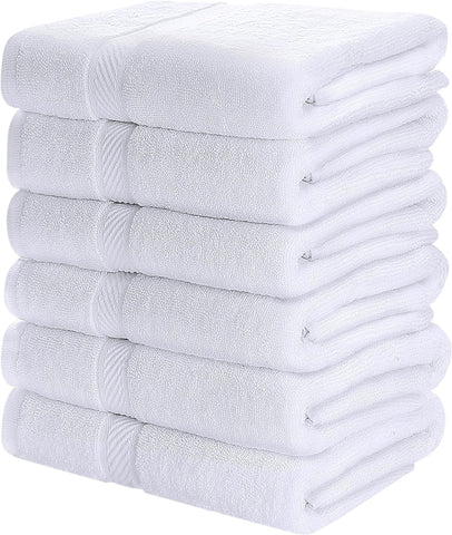 SIMPLI-MAGIC bath towel white 25x50 stack shows compact storage and softness