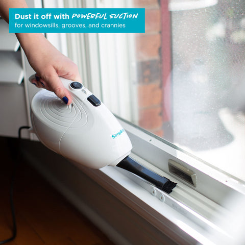 Simplicity Vacuums Flash Mini removes pet hair from upholstery.