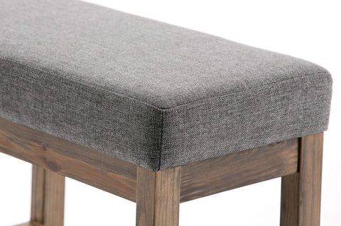 SIMPLIHOME Milltown entryway placement suggests quick seating near doors.