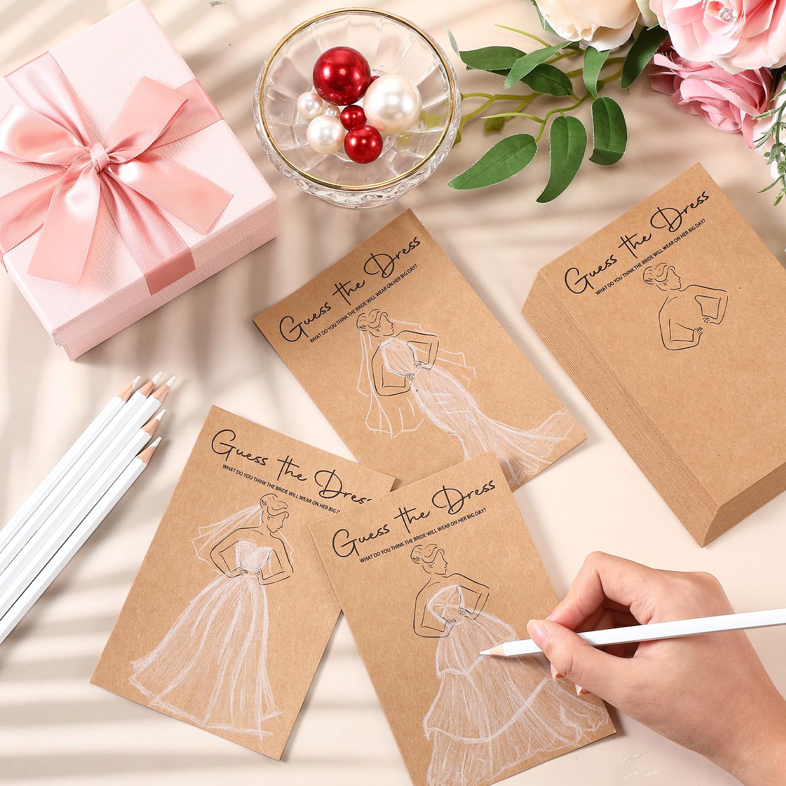 Sinload water-soluble pencils ready to draw, erase, and reimagine wedding dress ideas.