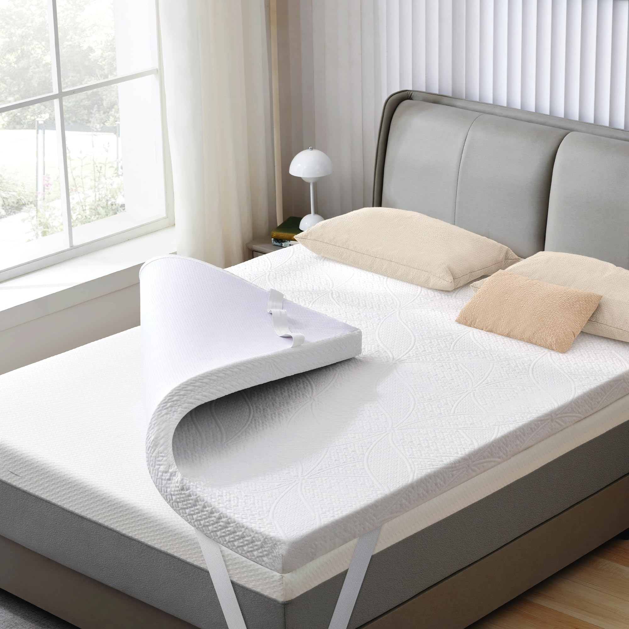 SINWEEK two-inch gel memory foam topper on bed for enhanced support and pressure relief.