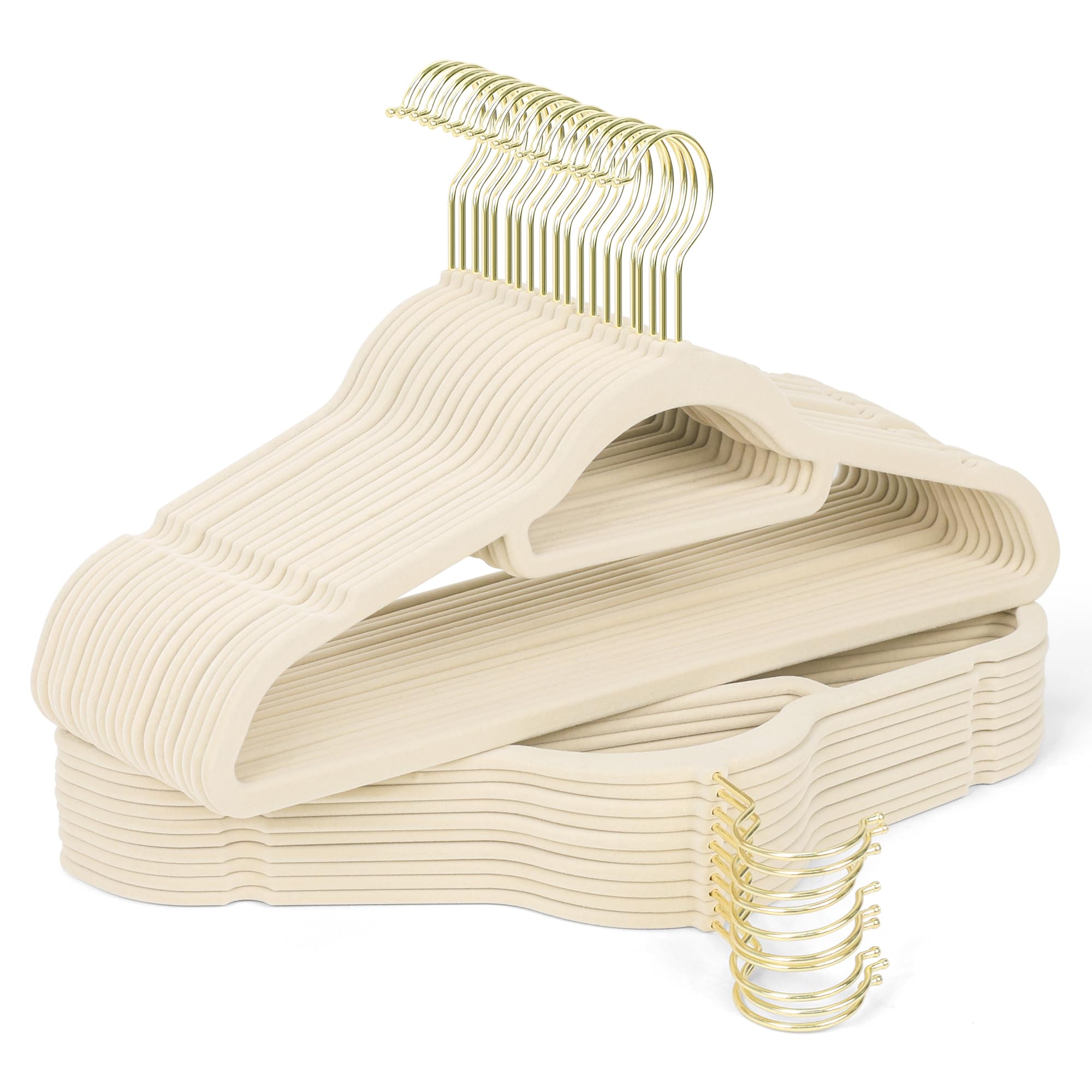 Sishynio velvet hangers with gold hooks cradle a beige dress, preventing slips and wrinkles.