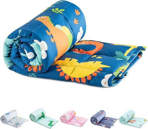 Sivio weighted blanket with blue dinosaur on bed, offering cozy comfort for restful nights.