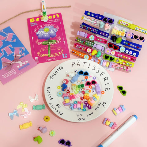 Skdtazrz tools include glue, markers, and tweezers.