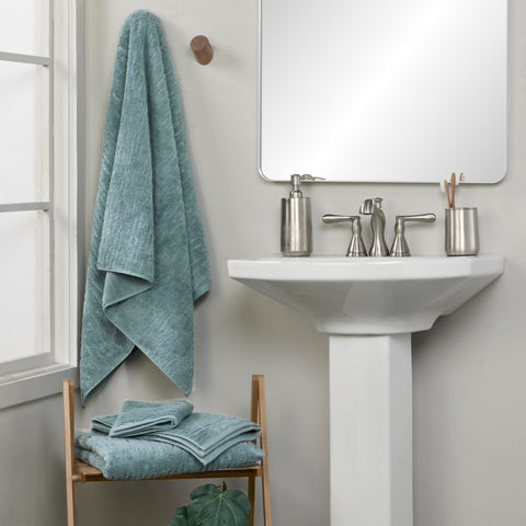 Dense 600 GSM teal CloudSoft towel demonstrates plush absorbency