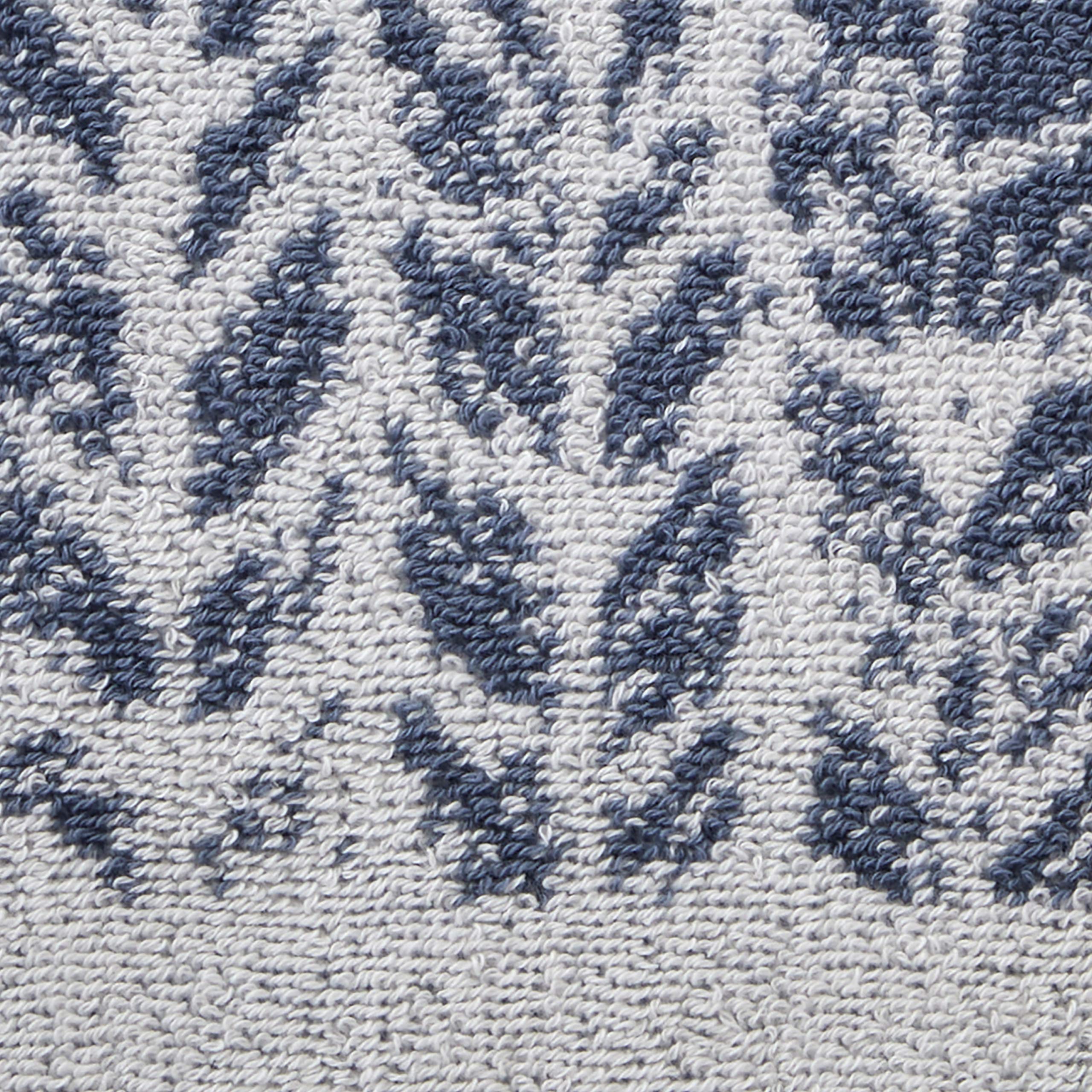 SKL Home Distressed Leaves hand towel with dual-sided jacquard offers versatile decor