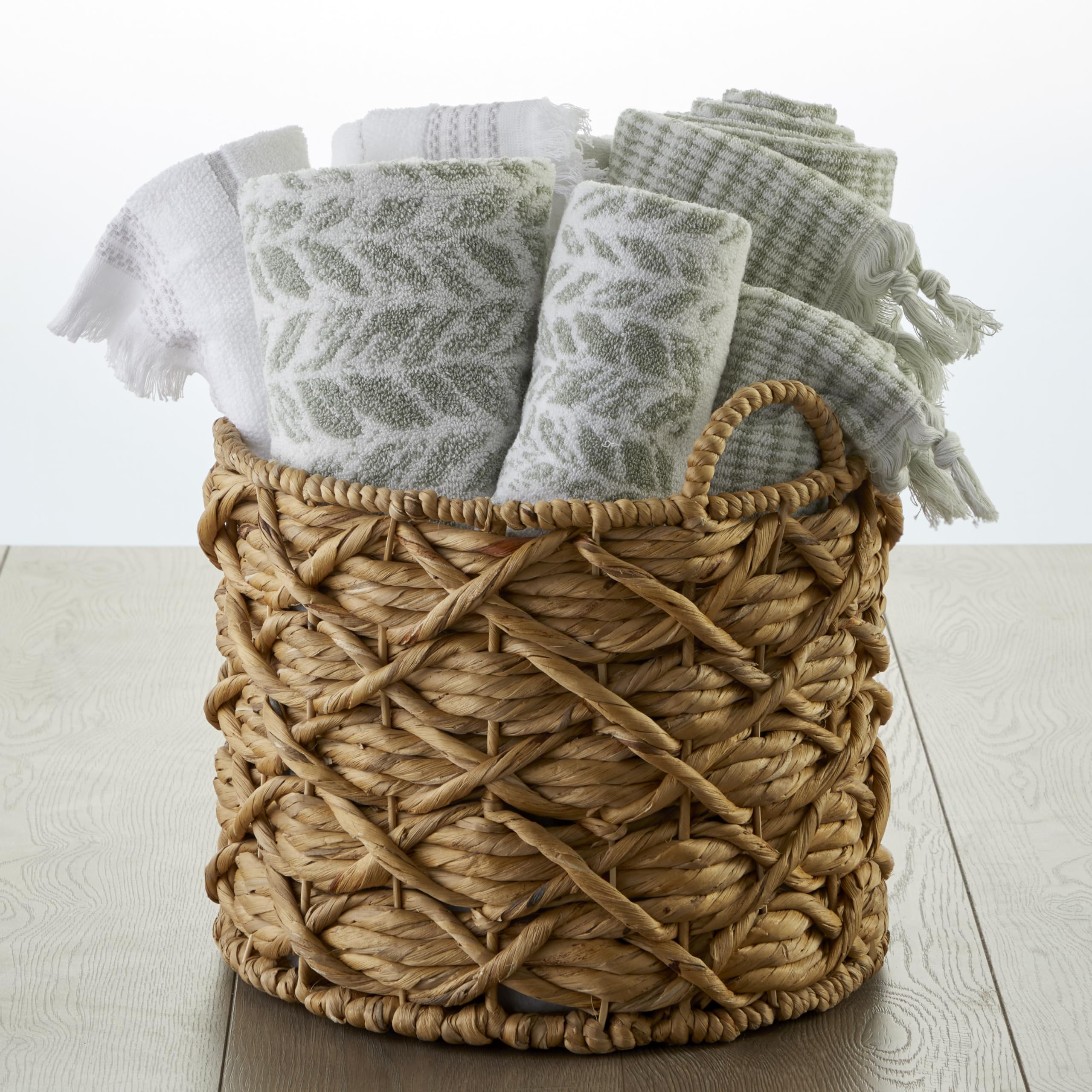 SKL Home Distressed Leaves hand towel flat lay with two-tone jacquard design