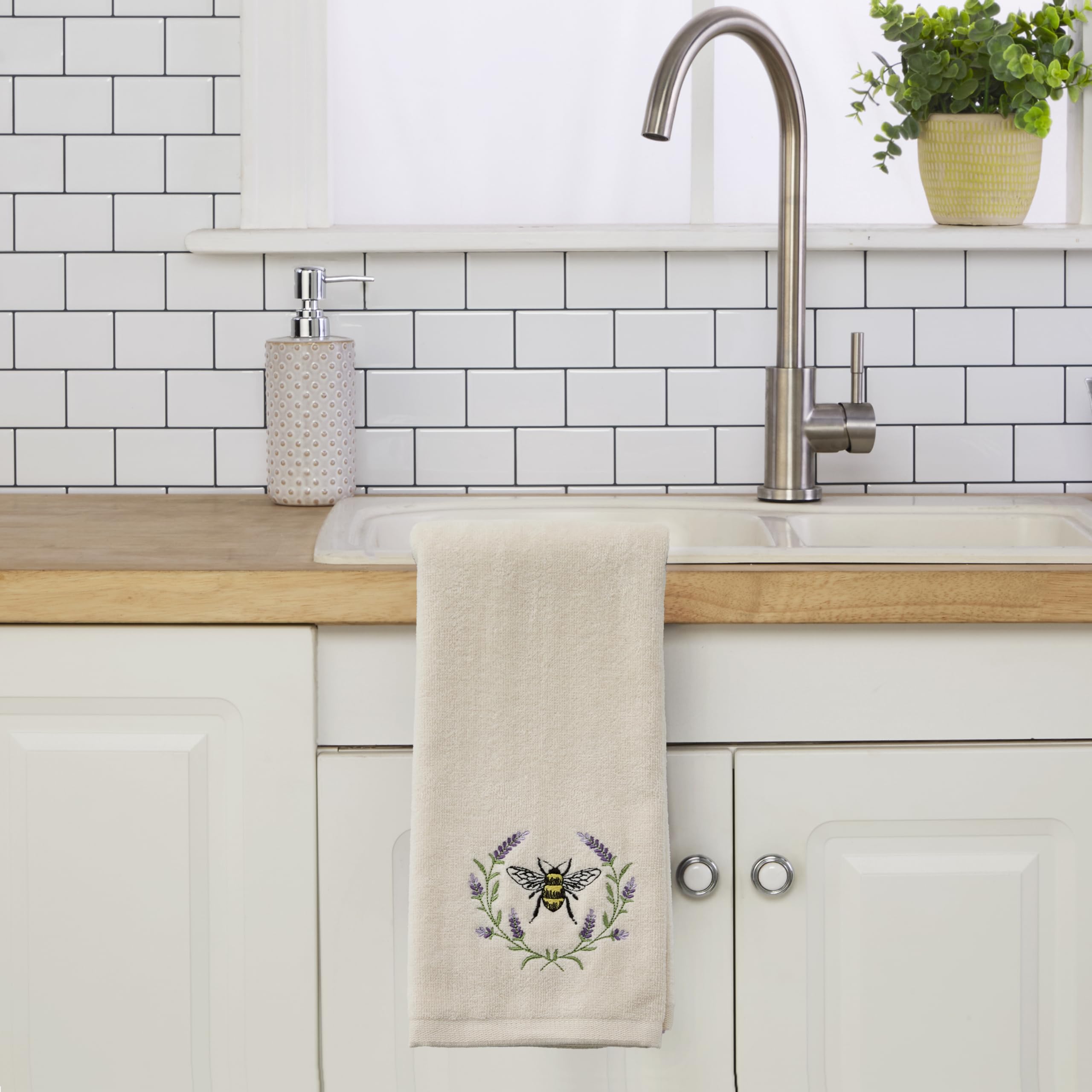 SKL Home bee-lavender towels serve as a charming host gift