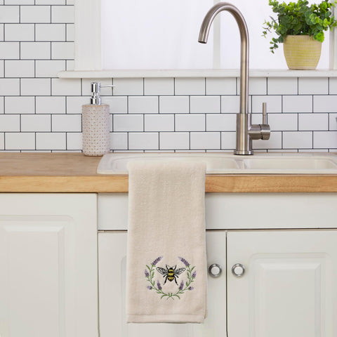 SKL Home bee-lavender towels serve as a charming host gift