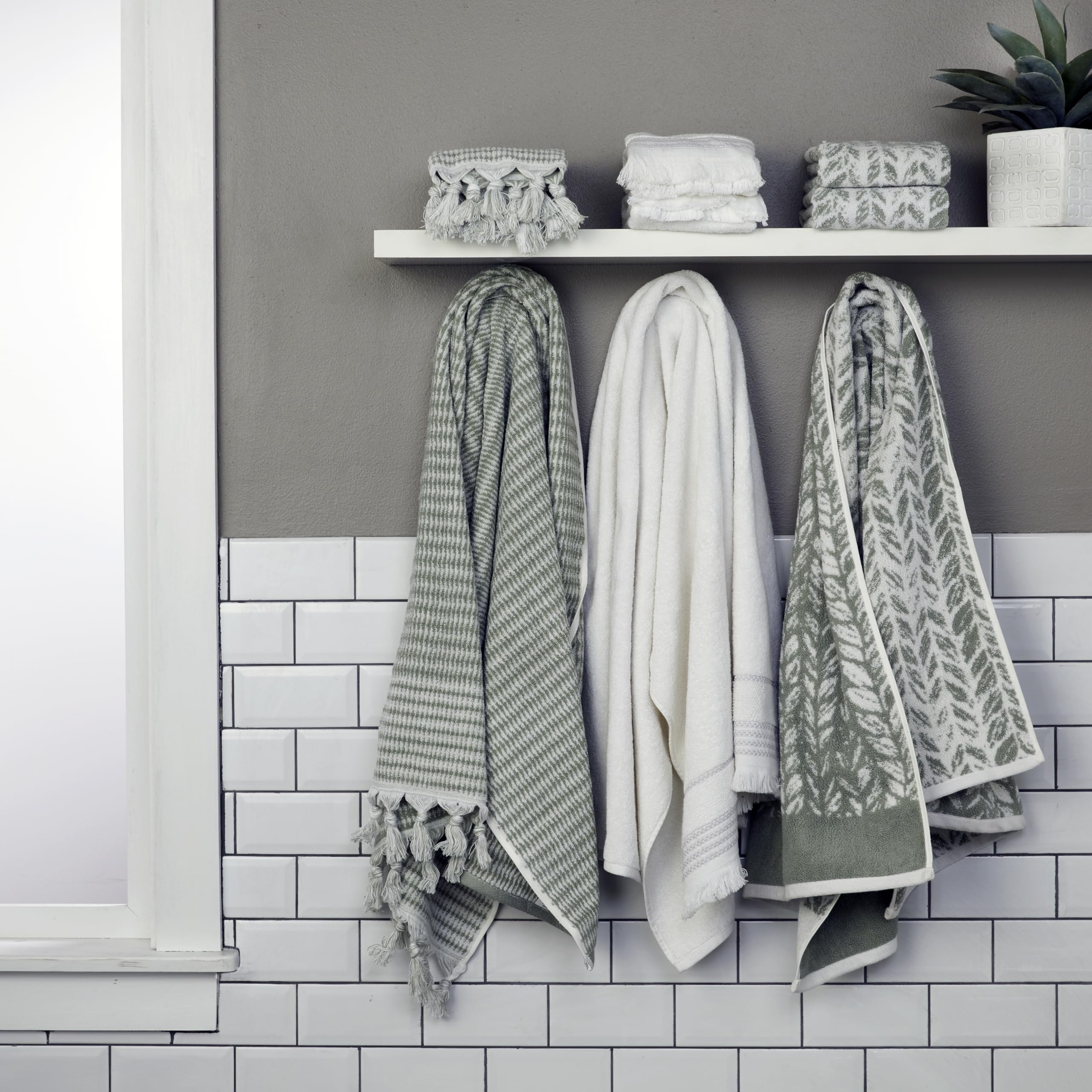 SKL Home Sage color towel in a bathroom scene adds subtle decor