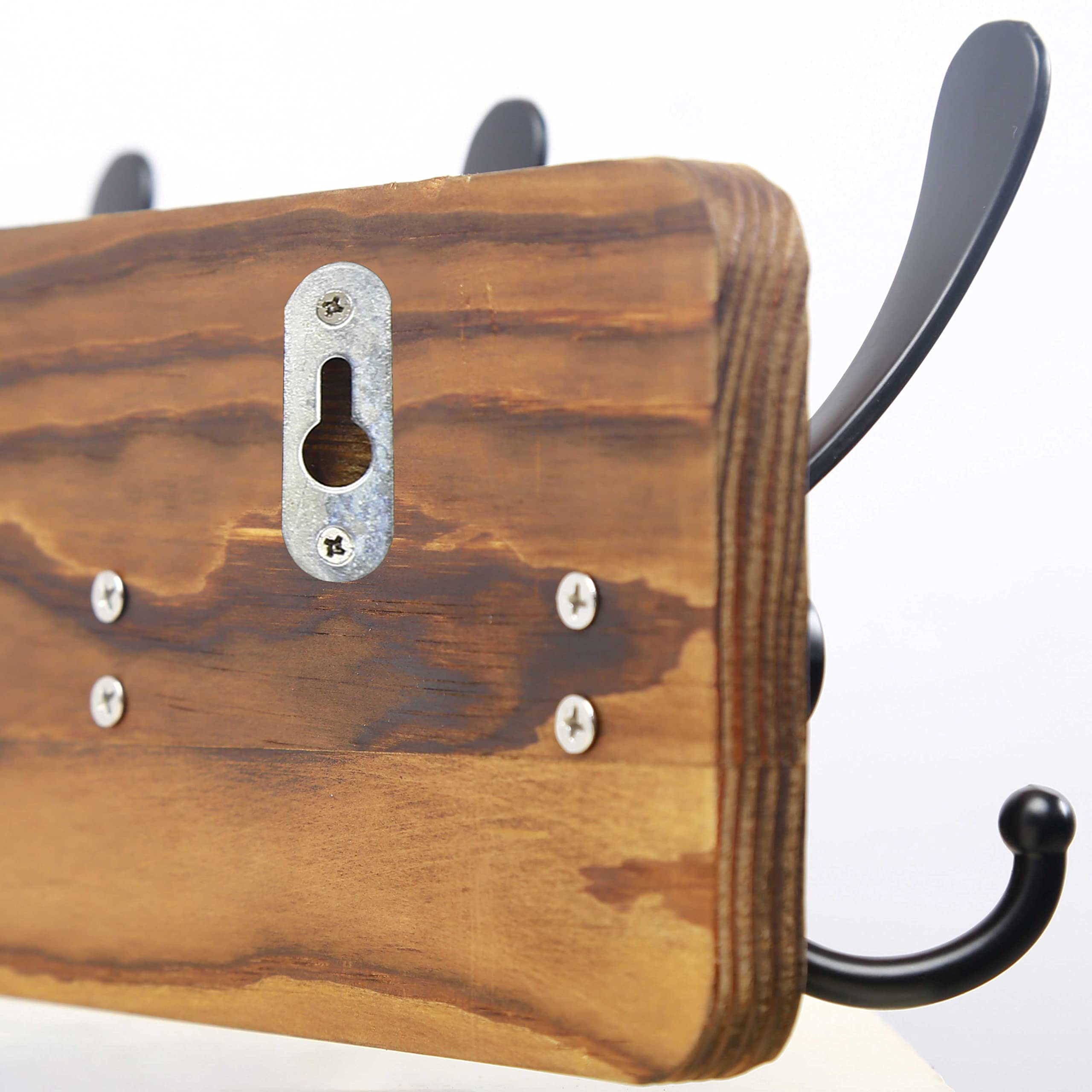 SKOLOO bedroom-ready coat rack mounted on wood wall with rustic finish.