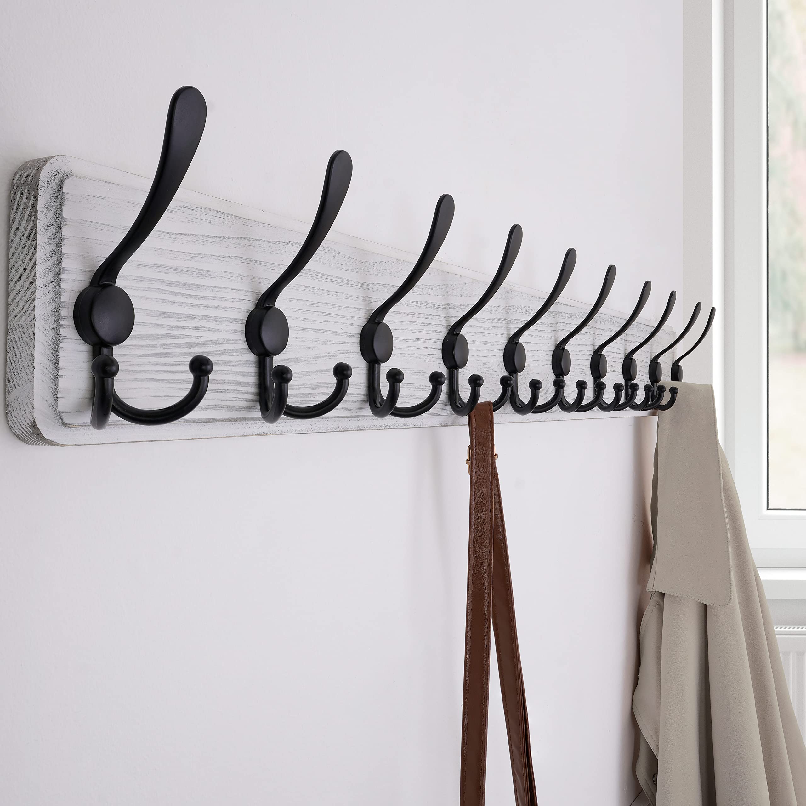 SKOLOO entryway setup displaying organized coats and accessories