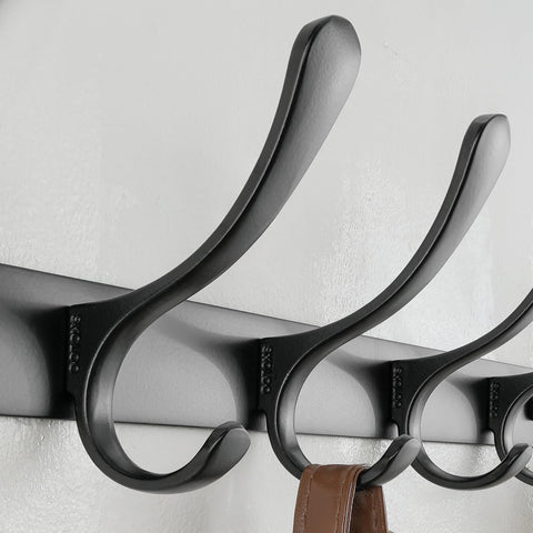 Entryway setup with coats and bags on SKOLOO rack