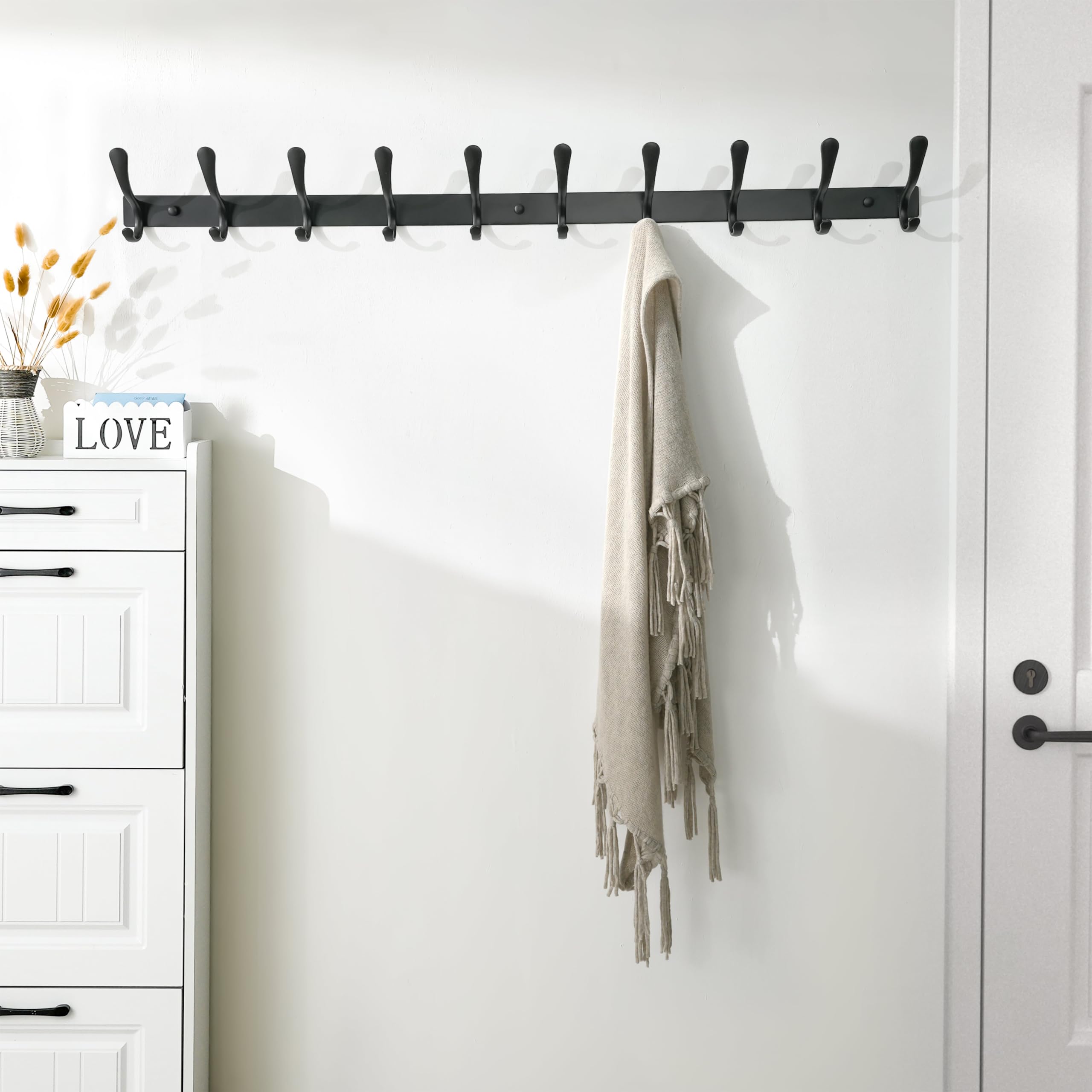 Side-profile view highlights curved ends protecting belongings