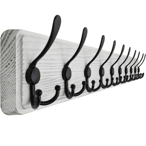 SKOLOO wall-mounted coat rack in weathered white showing rustic entryway appeal