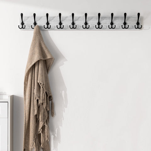 Solid pine plank detail from SKOLOO coat rack with visible wood grain
