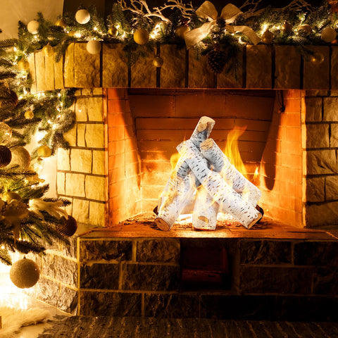 Skyflame ceramic logs under decorative lava rocks create stylish heat focus.