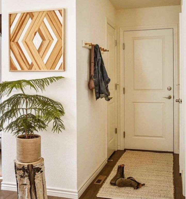 S & L Homes bedroom natural fiber rug adds texture and warmth.