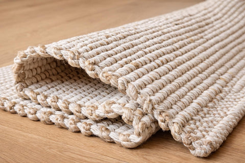 S & L Homes handwoven rug with subtle, unique variations.