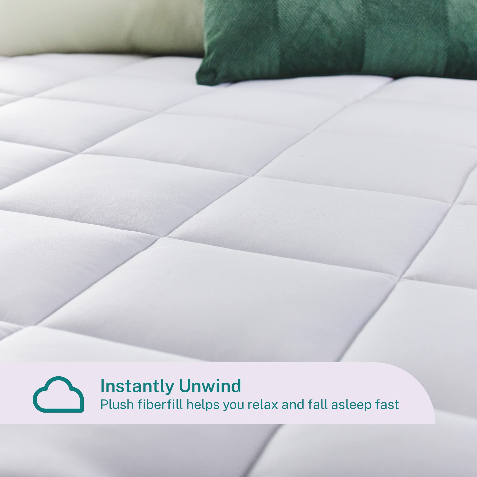Sleep Innovations king-size topper fits securely on a standard bed.