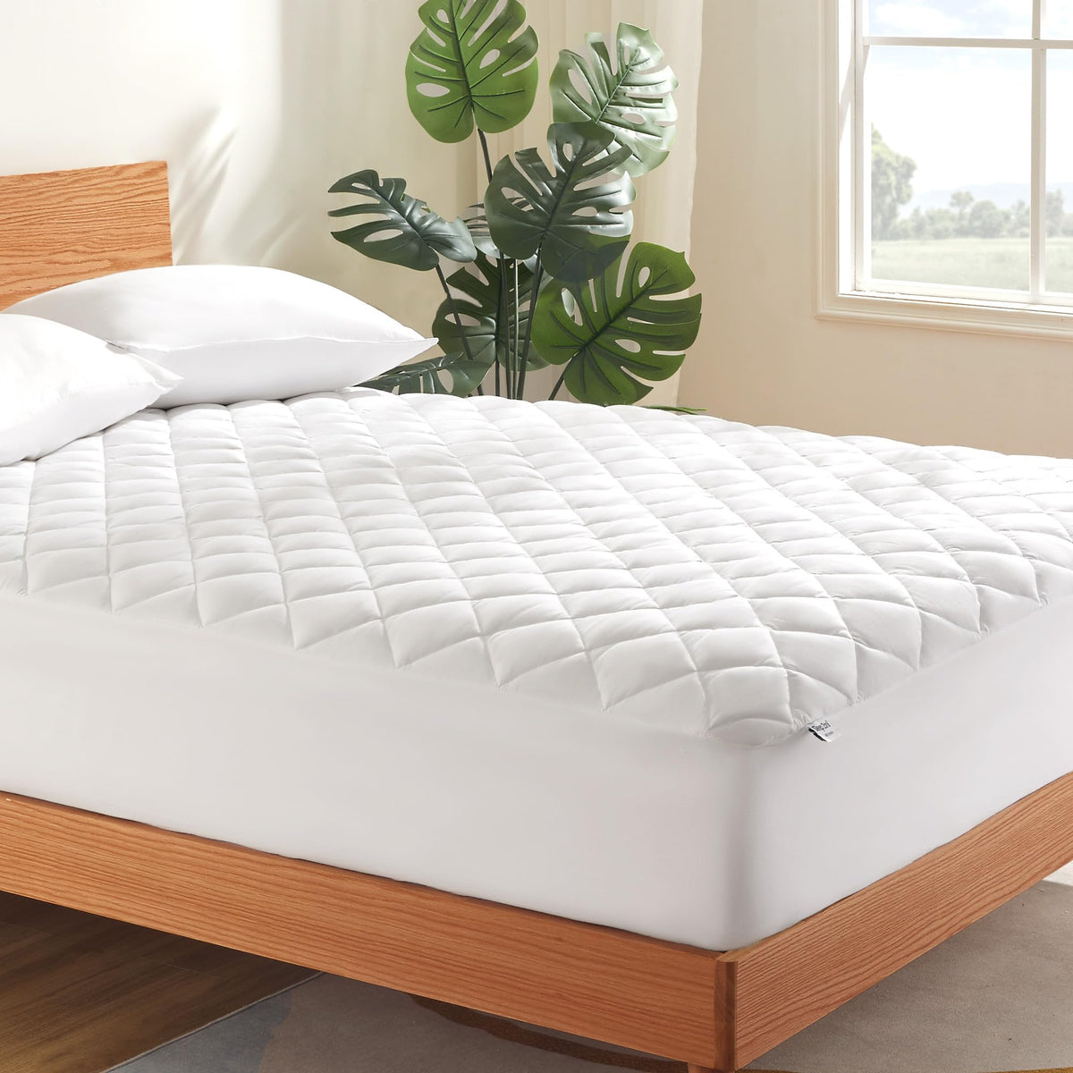 Sleep Zone mattress cover on a bed showing a quilted top for cooling comfort.