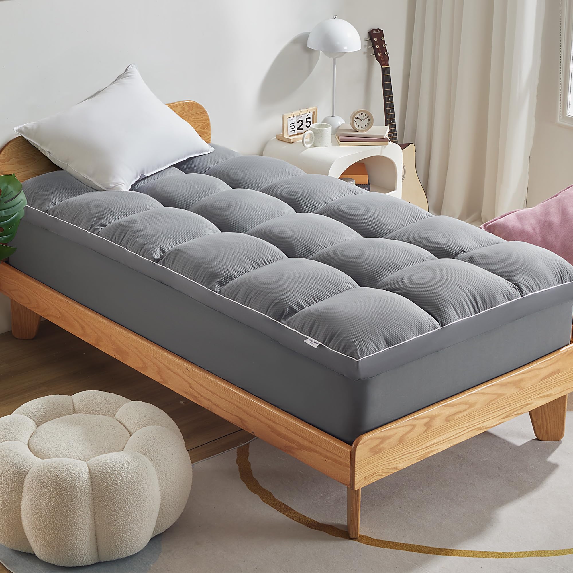 Sleep Zone twin mattress topper with plush soft surface for enhanced comfort and cool sleep.