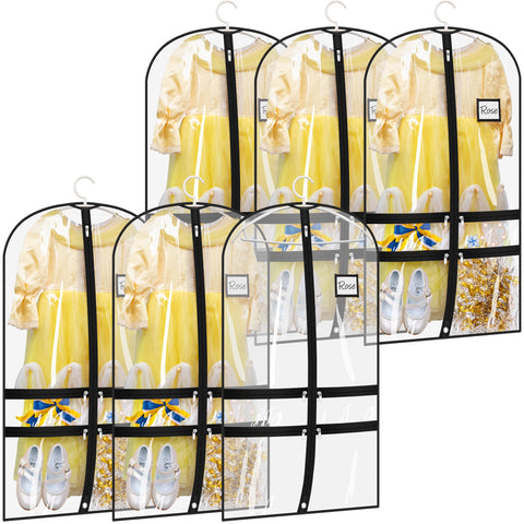 Sleeping Lamb six-pack clear dance garment bags laid out for quick costume checks