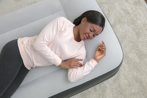 SleepLux twin air mattress at 15-inch height for stable sleeping surface.