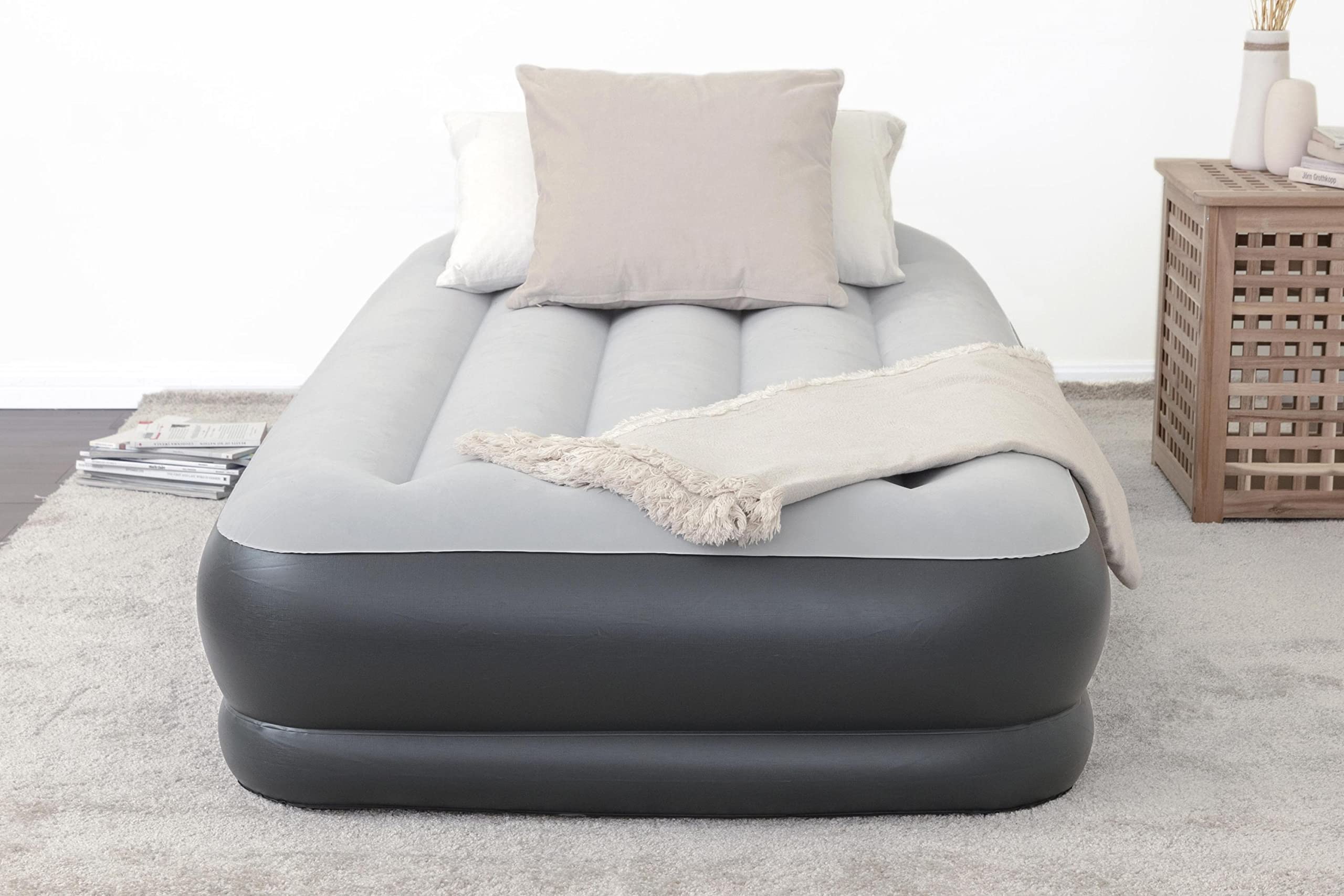 SleepLux Tritech air mattress with built-in pump for quick setup and firm support.