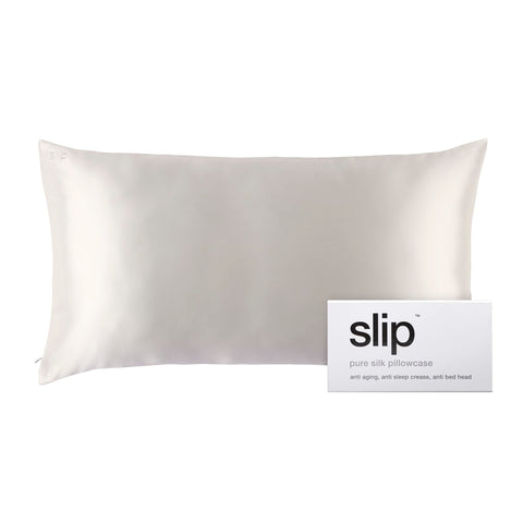 White king-size Slip King pillowcase complements luxury bedroom aesthetics.