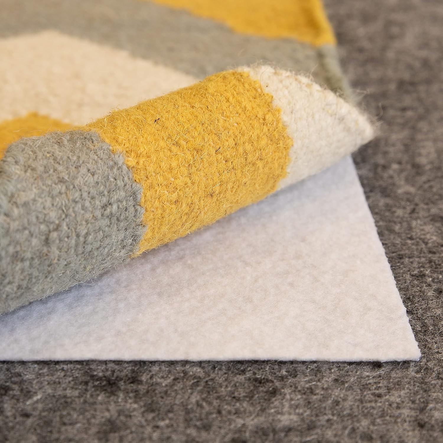 Slip-Stop Magic Stop rug pad cleans easily with a damp sponge.