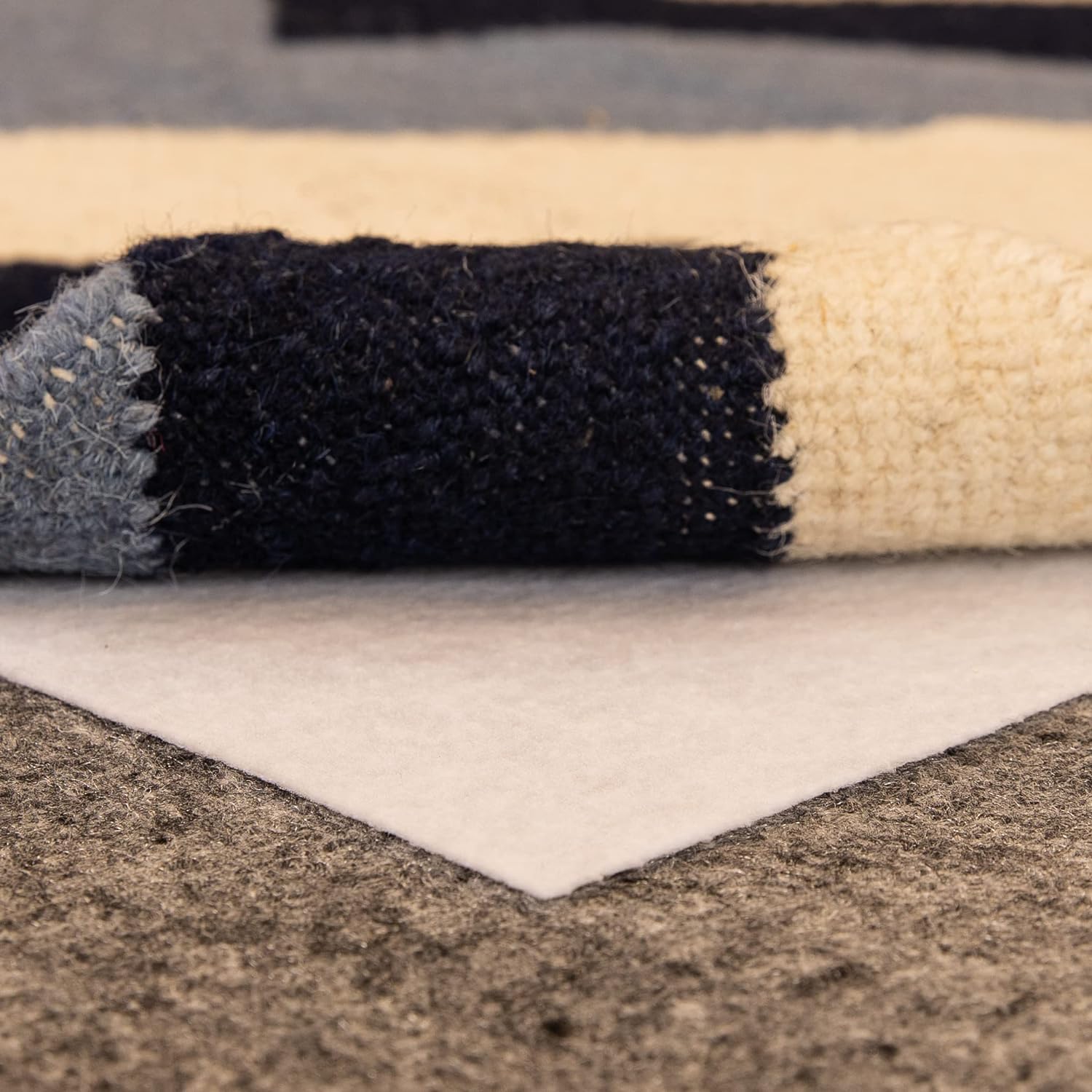 Slip-Stop Magic Stop rug pad non-slip adhesive provides stable grip.