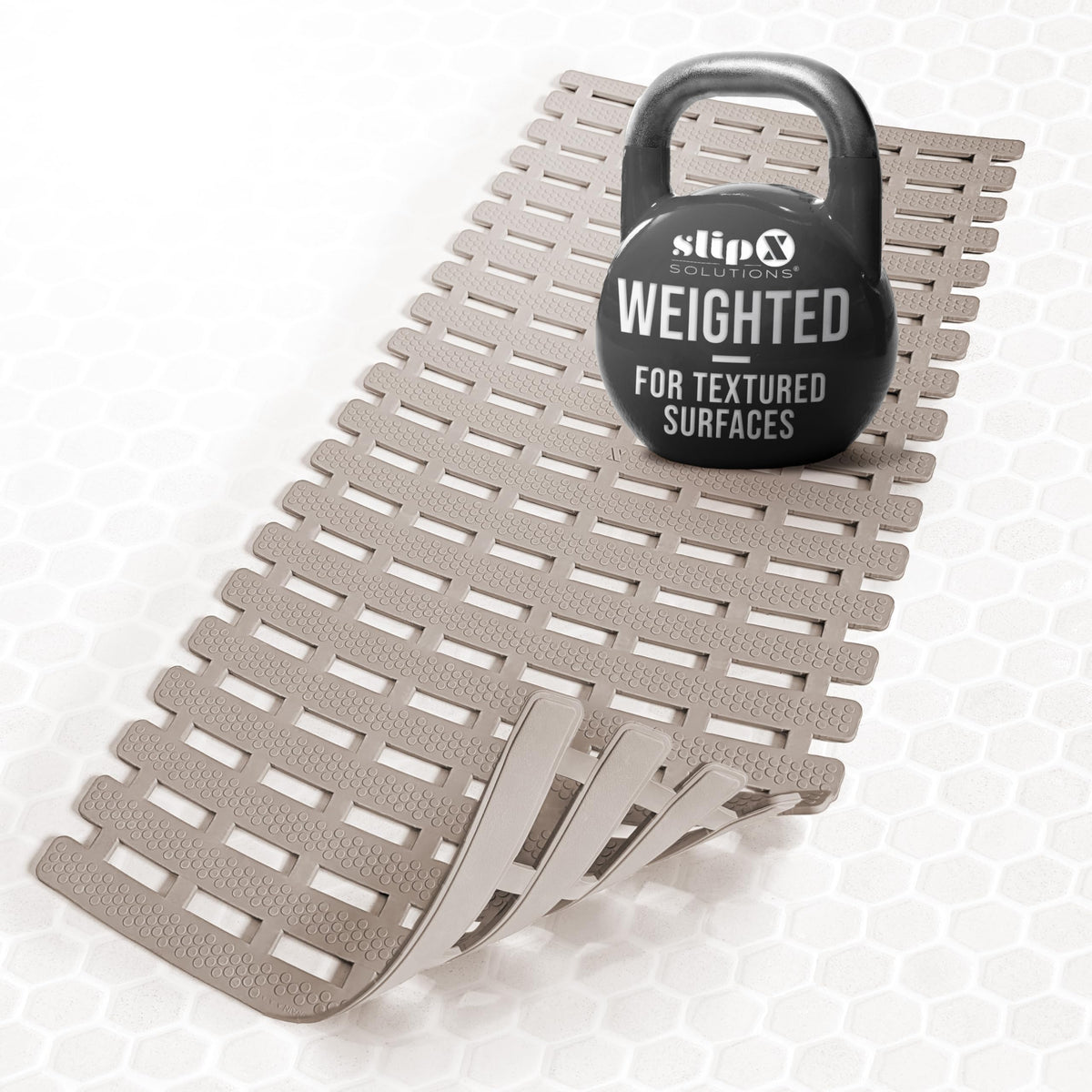SlipX Solutions weighted non-slip bath mat on textured tub surface for secure footing.