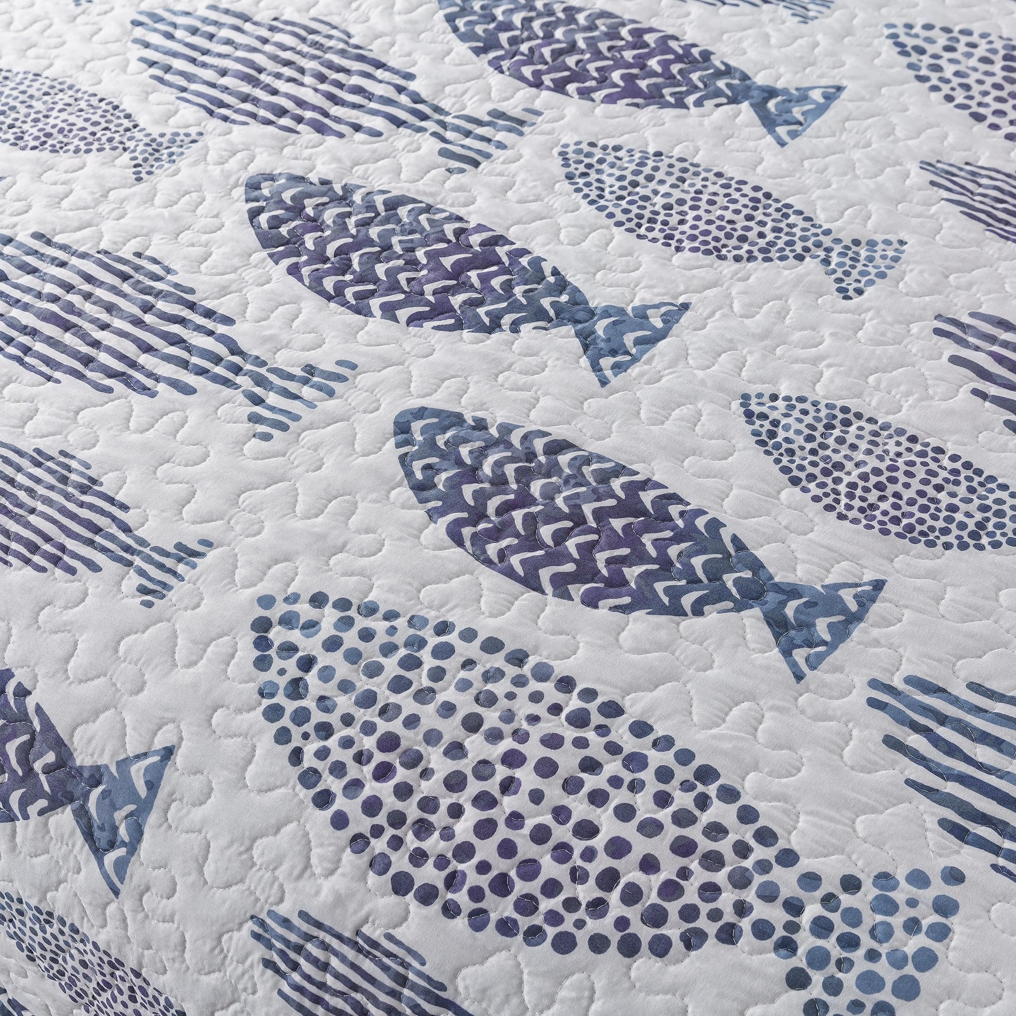 Lightweight polyester shell and fill used in the Sea of Dreams quilt set.