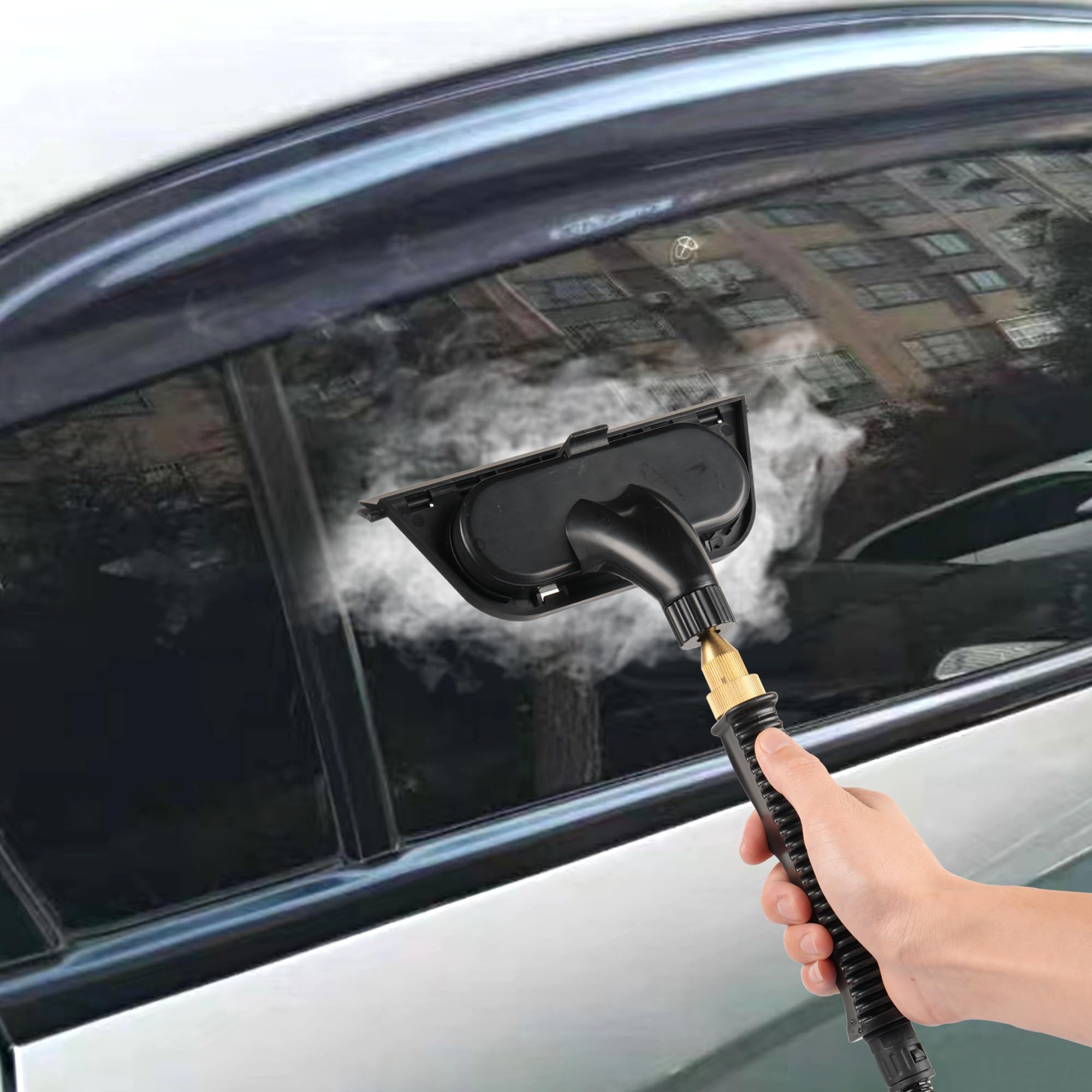 Operator wearing silicone gloves using steam cleaner safely.